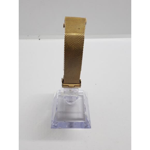Women\'s Timex dress watch. Square iridescent face. Gold band. main image 8